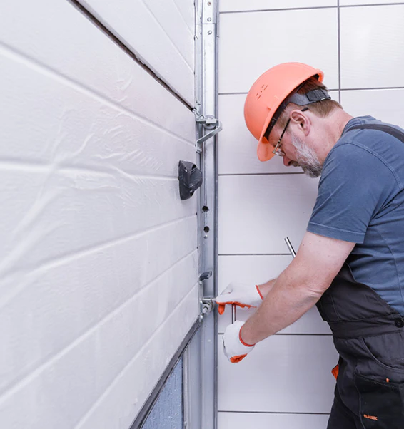 a-garage-door-technician-performing-garage-door-maintenance-knoxville-tn