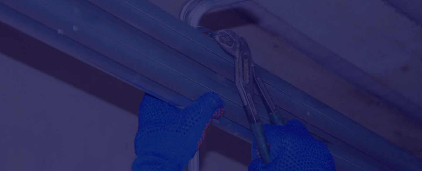 man-working-on-a-house-garage-door-opener-system-knoxville-tn